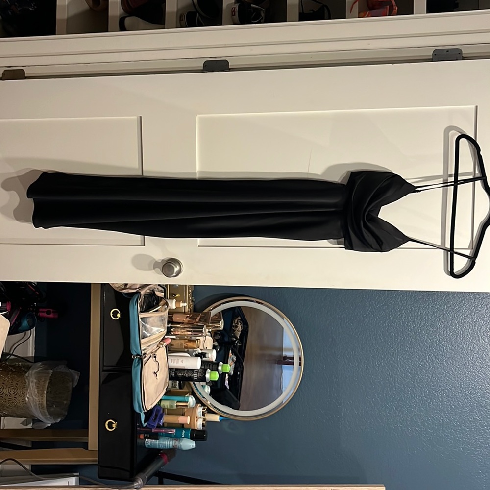 Black mid length silk dress, cut out sides, cross cross back